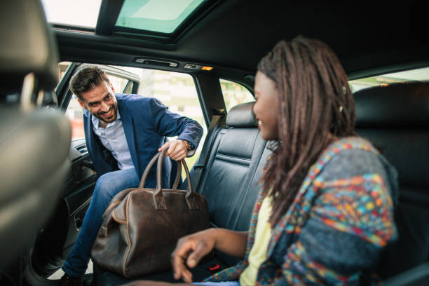istock Friends traveling by a car 1150136742
