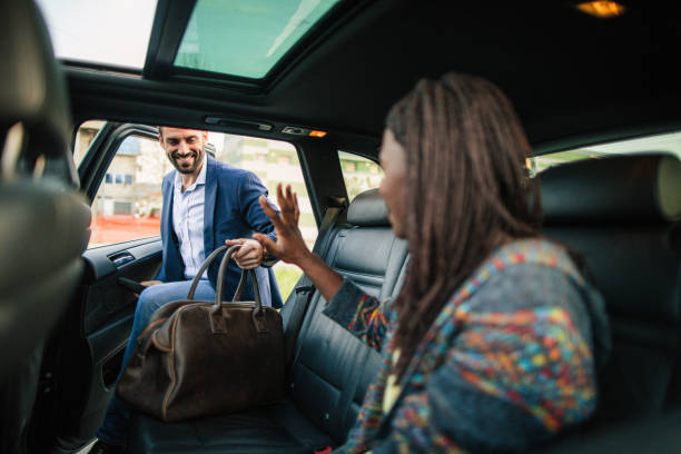 istock Friends traveling by a car 1150137511