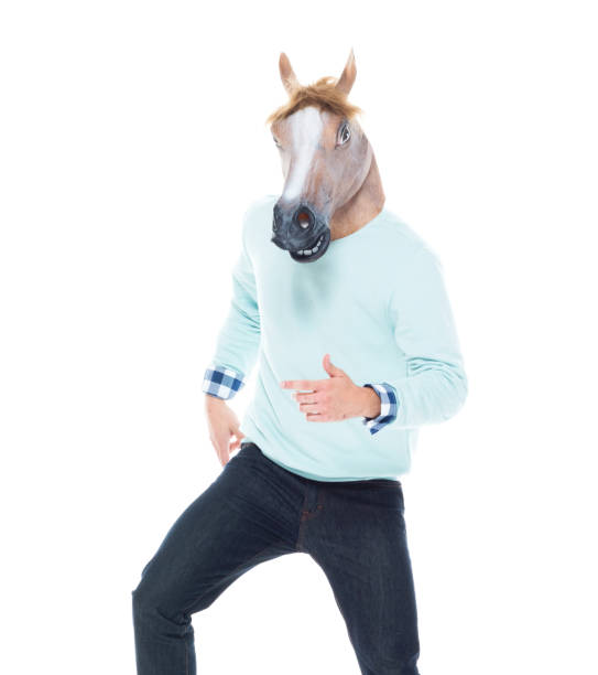 istock Man with horse mask is dancing 1150140550