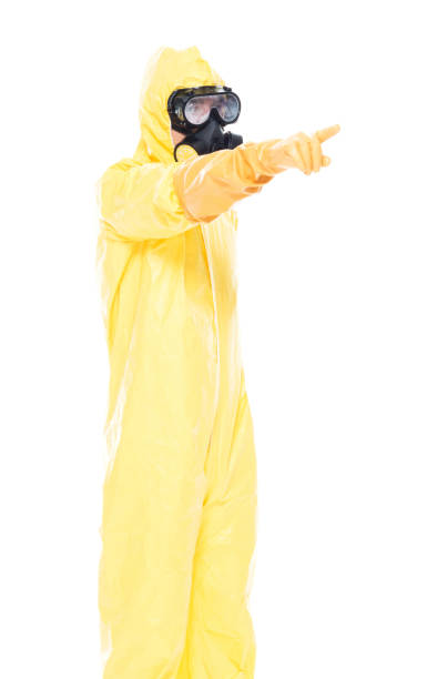 istock Man in protective clothing and pointing forward 1150142036