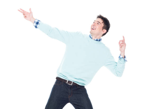 istock Handsome young man looking up in surprise 1150142386
