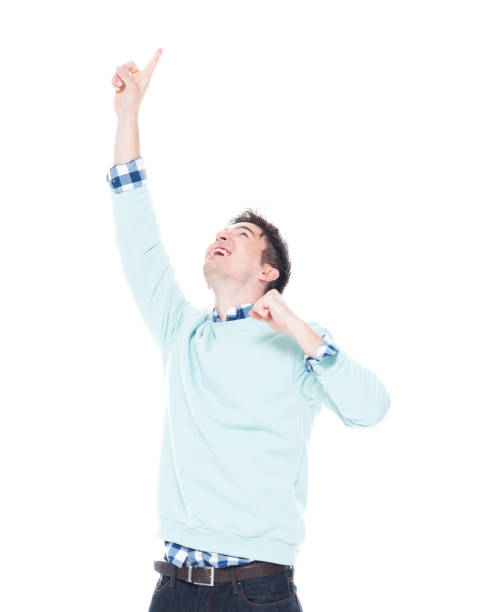 istock Handsome young man looking up and cheering 1150144190