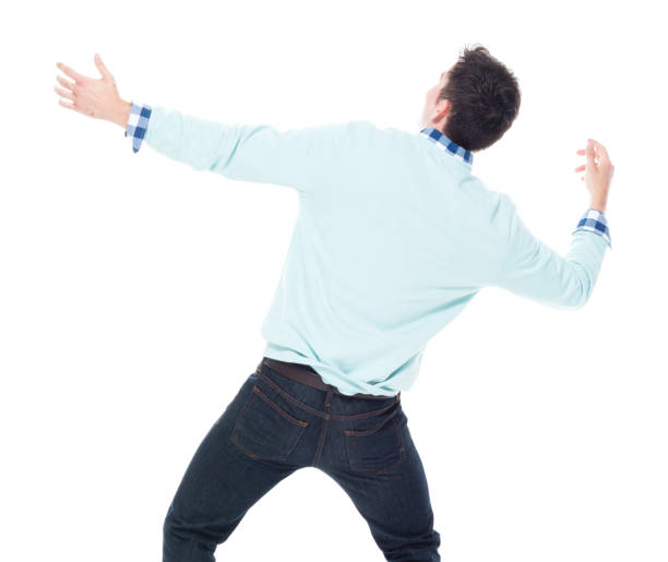 istock Handsome young man looking up in surprise 1150145149