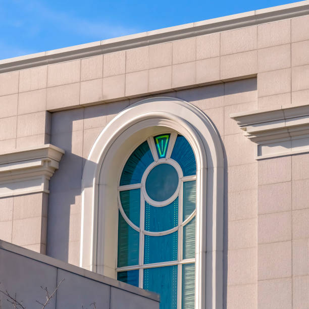 istock Square Building exterior with vibrant blue sky background on a sunny day 1150156679