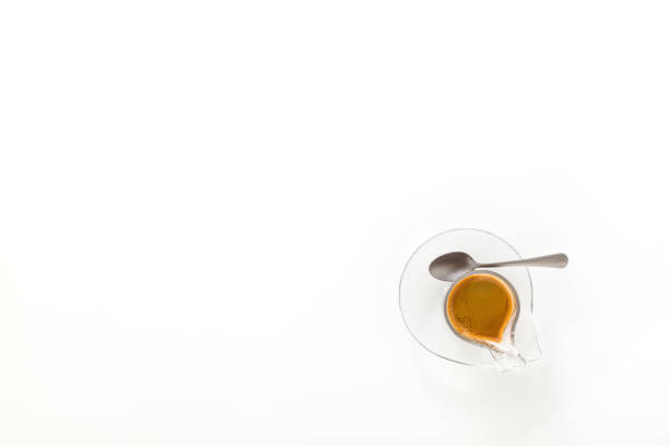 istock Italian espresso coffee in glass cup isolated on white background. copy space 1150160718
