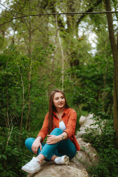 istock Beautiful Young Woman in Nature 1150163340