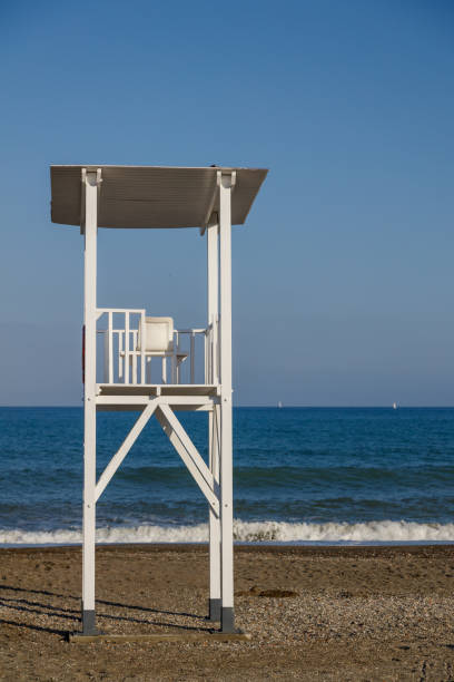istock Lifeguard tower on the beach 1150163555