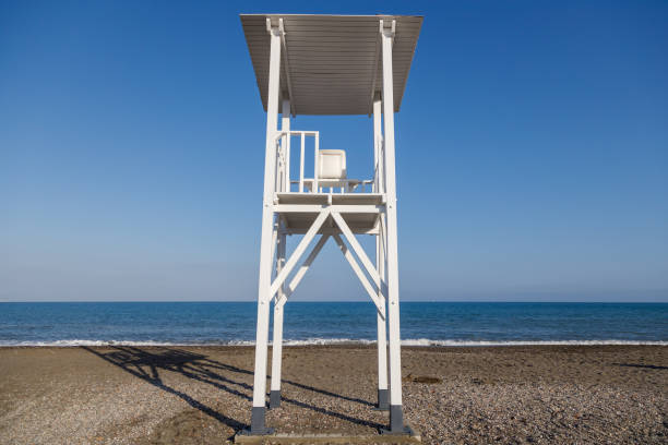 istock Lifeguard tower on the beach 1150163566