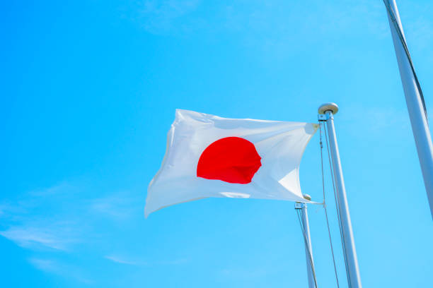 istock Japan flag and blue sky 1150164700