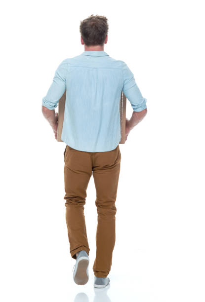 istock Good looking man holding a brown box 1150164933