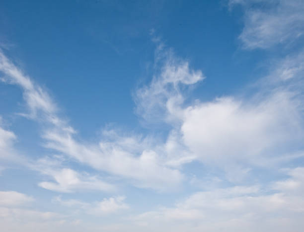 Cirrus Clouds in a Blue Sky Cirrus clouds appear in a blue sky over Tule Lake National Wildlife Refuge, California, USA. jeff goulden national wildlife refuge stock pictures, royalty-free photos & images