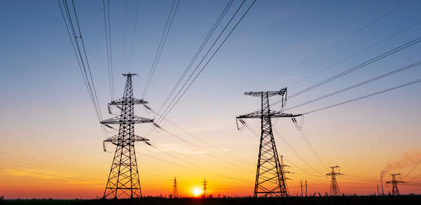 istock high-voltage power lines at sunset. electricity distribution station . 1150170698