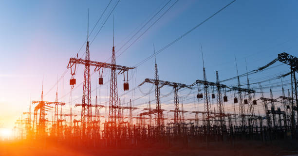 High-voltage power lines. Electricity distribution station. high voltage electric transmission tower. Distribution electric substation with power lines and transformers High-voltage power lines. Electricity distribution station. high voltage electric transmission tower. Distribution electric substation with power lines and transformers. electricity substation photos stock pictures, royalty-free photos & images