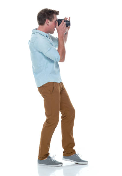 istock Handsome male photographer 1150175113