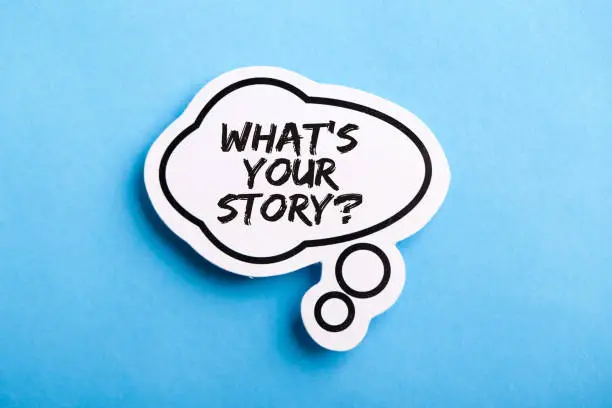 What Is Your Story speech bubble isolated on the blue background.
