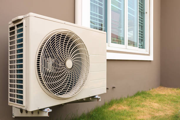 istock Air conditioner compressor outdoor unit installed outside the house 1150187641