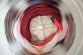 Abstract blur Clothes in washing machine during work