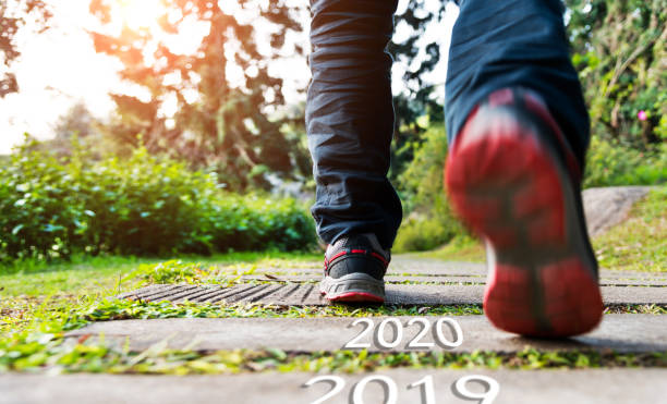 istock Number of 2019, 2020 on stones footpath 1150190212