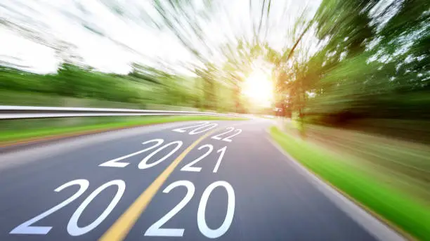 Photo of Blurred road with Number 2020, 2021, 2022