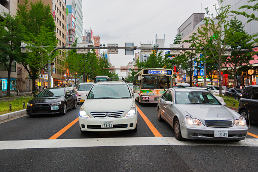 OSAKA, JAPAN - May 3 : Traffic transportation in Namba May 3, 2016. Cars stop and waiting for the green light signal.