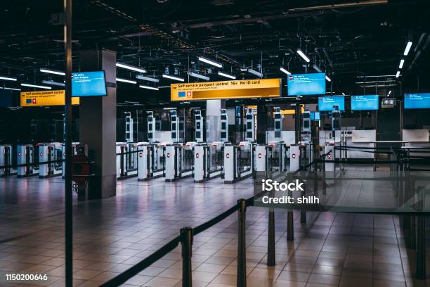 Arrival Immigration Passport Control Point At Amsterdam Schiphol Stock Photo - Download Image Now