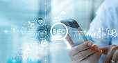 SEO Search Engine Optimization Marketing concept. Voice Search. Businessman using mobile smartphone and searching on network connection. Digital online marketing. Business technology.