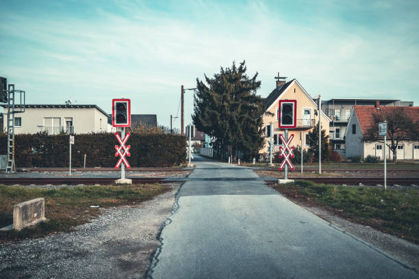 railroad crossing in rural landscape