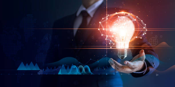 istock Businessman holding light bulb and brain network with icon business and technology, innovative in futuristic, network connection on virtual interface background, abstract, innovation and business technologies concept. 1150203443