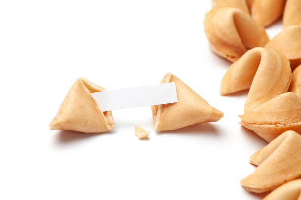 istock Chinese fortune cookies. Cookies with empty blank inside for prediction words. Isolated on white background. 1150203674