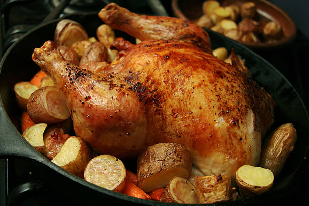 istock Roasted chicken with roasted potatoes and carrots 115020725