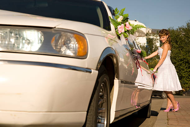 istock Bride is standing by limousine car 115020800