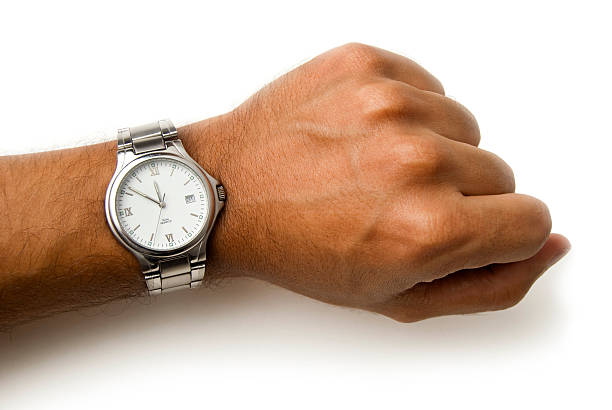 armbanduhr auf dem handgelenk-clipping path - minutehand stock-fotos und bilder