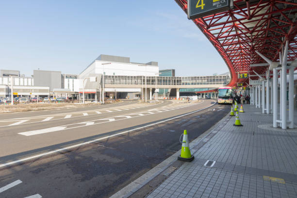 bus stop at the new chitose (shin chitose) airport in winter in hokkaido, japan - new chitose imagens e fotografias de stock