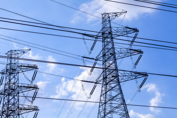 istock Power transmission tower with blue sky background 1150214121