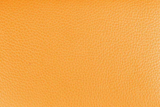 istock Yellow leather background texture close up 1150216158