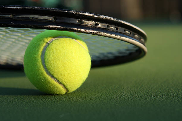 istock Tennis Ball and Racket close up 115021747