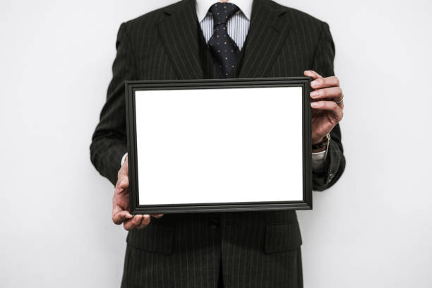 istock Businessman with a white board 1150219416