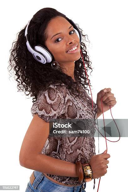 Young Woman Listening To Music Stock Photo - Download Image Now - Adult, Africa, African Ethnicity