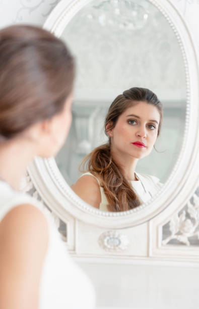 istock Beautiful Young Woman At Her Dressing Table 1150229739