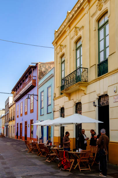 People chatting in one of the historic alleys of San Cristóbal de La Laguna (commonly known as La Laguna), a city in the northern part of Tenerife whose old town has been declared a World Heritage Site by UNESCO.