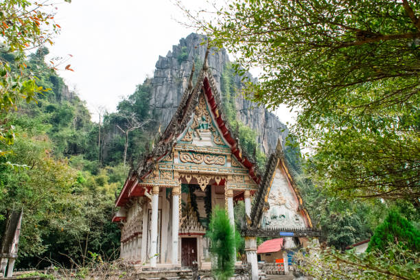 istock Thai temple beside the mountain 1150238446