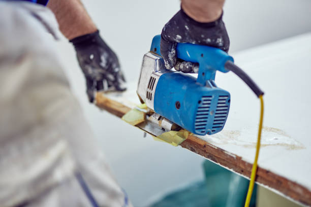 istock Handyman fixing / working on a house renovation. 1150239922