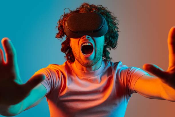 istock Man in VR glasses screaming at camera 1150239970