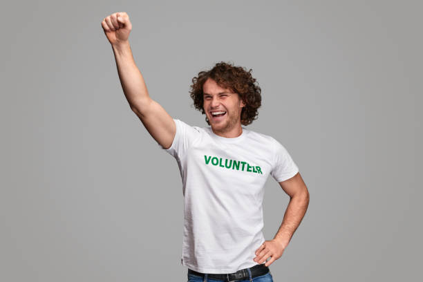istock Cheerful volunteer in superhero pose 1150240046
