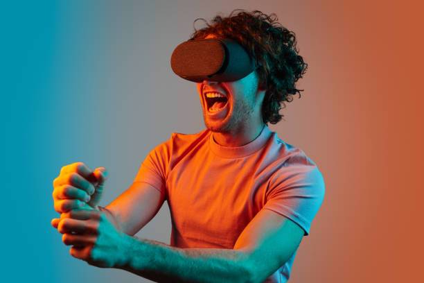 istock Excited male in VR headset 1150240052