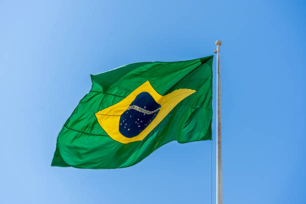 istock Brazilian flag on flagpole 1150242712