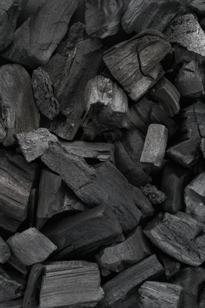 istock Black charcoal texture background. Close-up. Top view. 1150245877