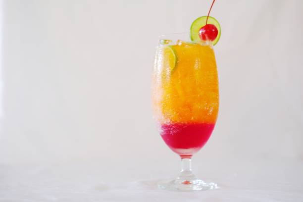 fruit punch cocktail on white background