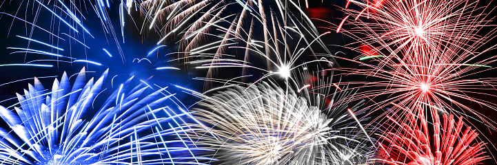 Blue white and red fireworks panoramic background