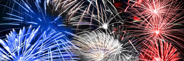 Blue white and red fireworks panoramic background Blue white and red fireworks panoramic background bastille day photos stock pictures, royalty-free photos & images